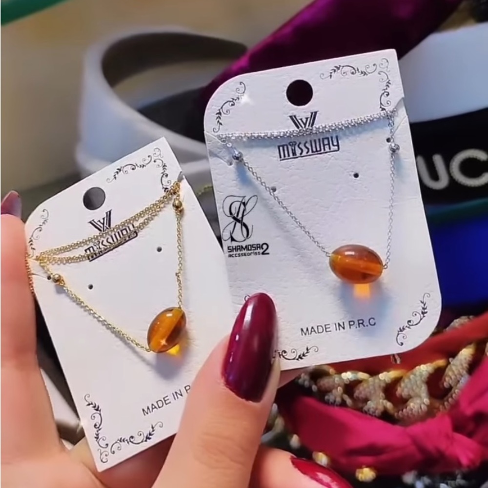 Beautiful accessories in gold or silver necklace plus I do have a bracelets too